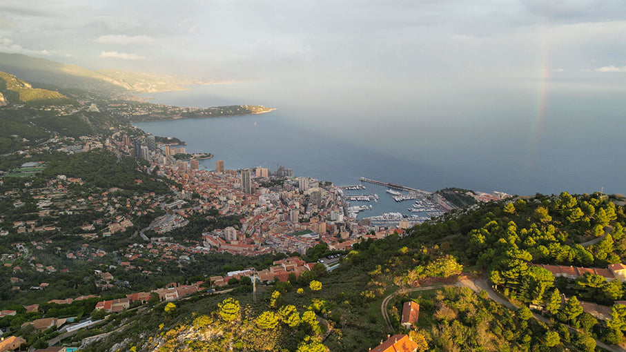 Photography of a rainbow over the skyline of Monaco